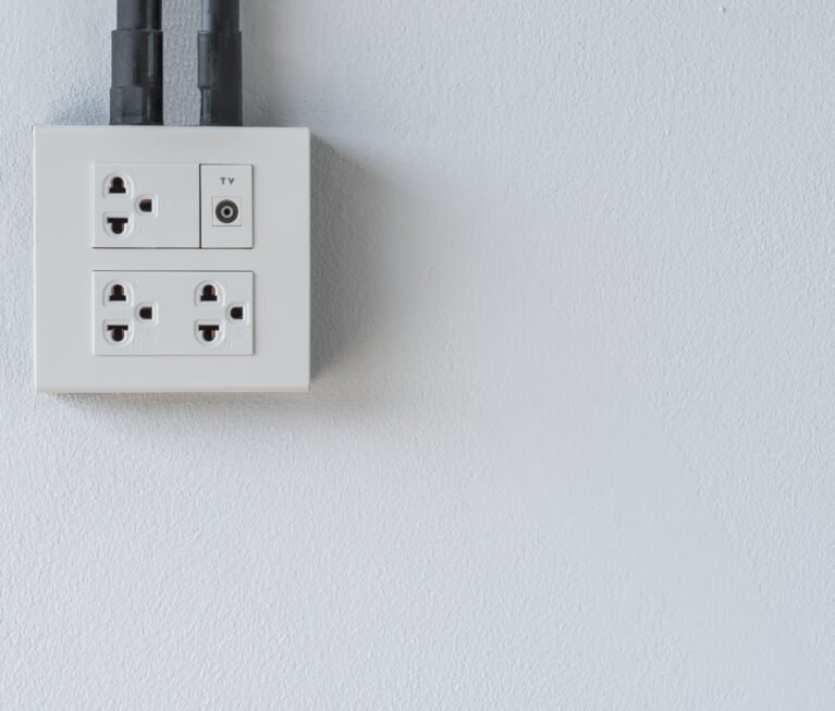 electric-socket-plug-and-cable-tv-plug-on-white-ce-2025-01-07-23-22-47-utc