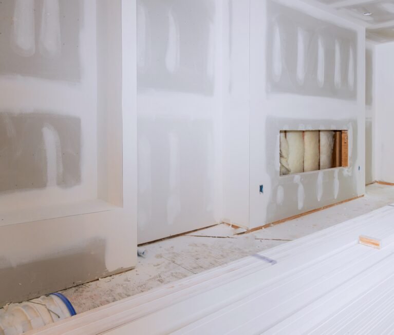 House hall interior with drywall completely installed and painted wall