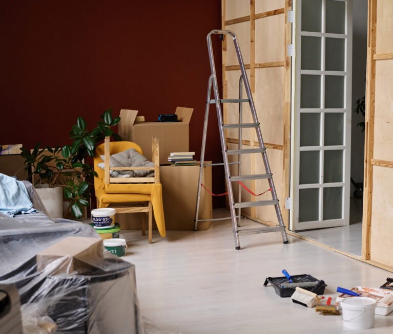 Repairment of new apartment with work tools and painted walls